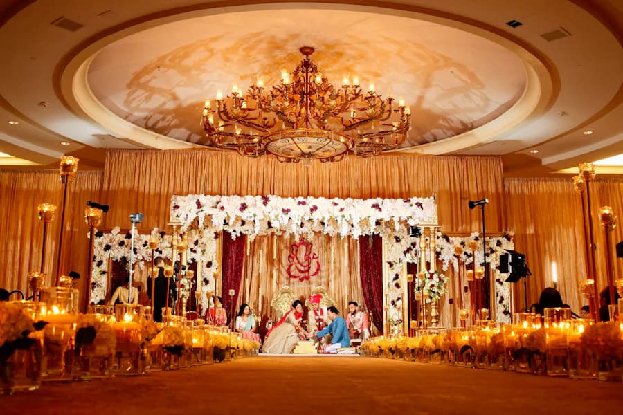 Wedding hall decorated with flowers and chandeliers